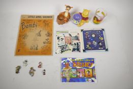 A collection of Disney memorabilia including the sheet music for 'Little April Shower' from Bambi,