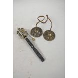 A Tibetan Buddhist prayer wheel and a pair of cymbals, wheel 8" long