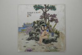 A Chinese famille verte porcelain plaque decorated with an erotic scene, 12" x 12"