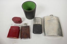 A Schweppes advertising spirit flask, 4" long, together with two other hip flasks, a leather cased