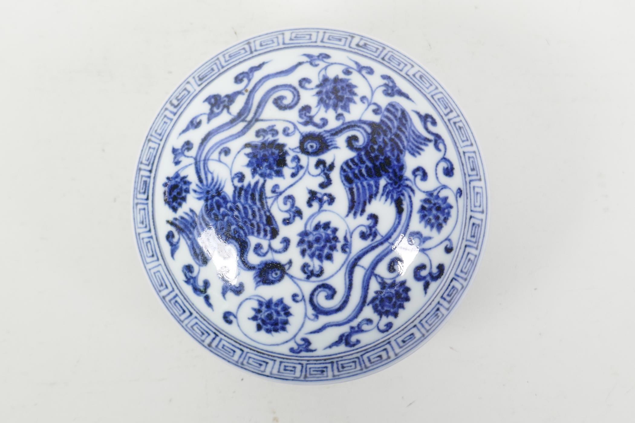 A Chinese blue and white porcelain box and cover, decorated with phoenix and lotus flowers, 6 - Image 2 of 4