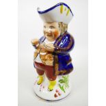 A large mid C19th Allerton's 'snuff taker' toby jug, featuring the full figure of an C18th gentleman