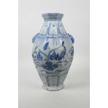 A Chinese blue and white Ming style pottery vase of octagonal form with two fo dog mask handles, and