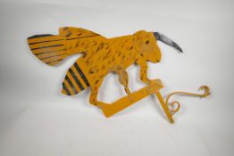 A painted iron weather vane in the form of a bee, 30" x 25"