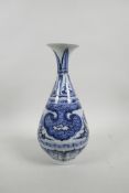 A Chinese Ming style blue and white porcelain pear shaped vase with a flared rim, 11" high