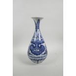 A Chinese Ming style blue and white porcelain pear shaped vase with a flared rim, 11" high