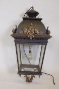 A large metal ceiling lantern with gilt features, 38"