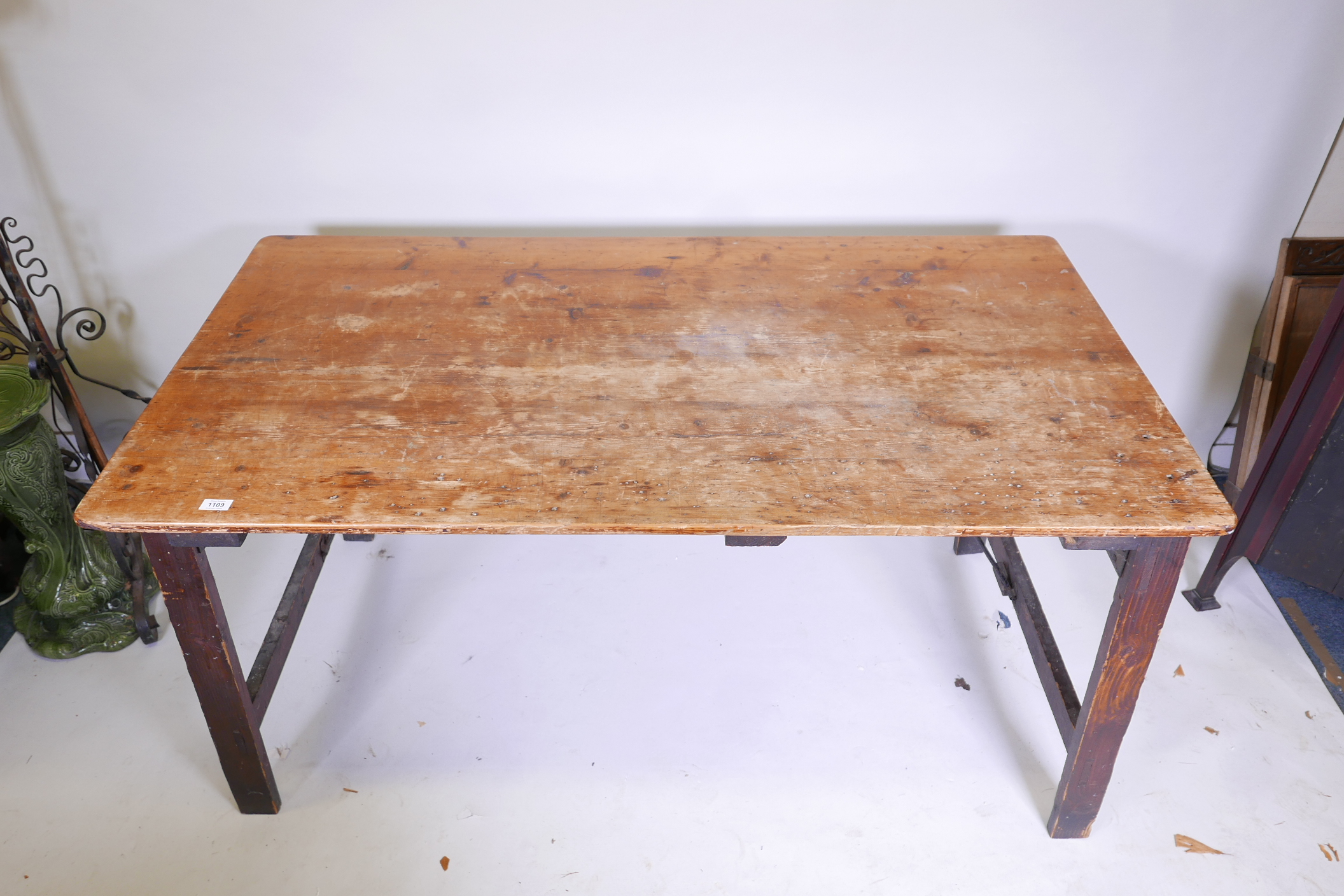 An antique pine trestle table with plank top, 60" x 32" x 30" - Image 2 of 2