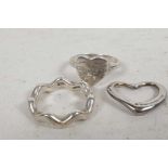 Two Tiffany silver rings and a heart pendant