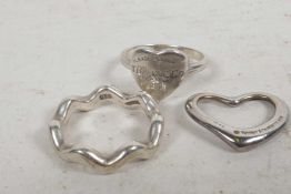 Two Tiffany silver rings and a heart pendant