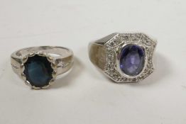An 18ct gold decorative ring inset with possibly a dark blue oval spinel, hallmarked, and another