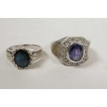 An 18ct gold decorative ring inset with possibly a dark blue oval spinel, hallmarked, and another