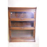 A Globe Wernicke style oak three section bookcase, 34" x 11" x 44"