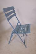 A set of eight wooden slatted folding garden chairs, painted in duck egg blue, A/F, 38" high x 18"