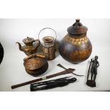 A quantity of African ethnographic items including a large carved wood storage jar and lid, 16½"