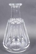 A Baccarat glass carafe of faceted octagonal design, 8" high