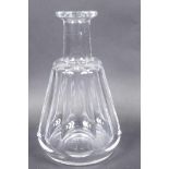 A Baccarat glass carafe of faceted octagonal design, 8" high