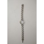 An Accurist lady's sterling silver bracelet watch, hallmarked, 7½" long, 45g