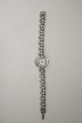 An Accurist lady's sterling silver bracelet watch, hallmarked, 7½" long, 45g