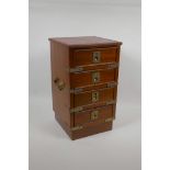 A campaign style miniature mahogany chest of four drawers with brass mounts and a leather inset top,