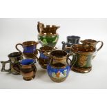 Nine pieces of lustre ware jugs and tankards, mostly C19th, largest jug 6" high