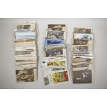 A quantity of early C20th postcards, topographical and saucy, approximately 500