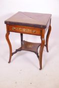 A Victorian inlaid rosewood envelope card table, with single drawer raised on cabriole supports