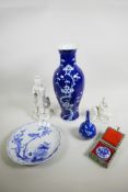 A mixed lot of Chinese decorative pieces consisting of a blue and white prunus baluster vase, 5½"