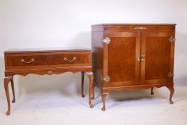 A figured walnut and brass mounted Queen Anne style cupboard / TV cabinet, labelled Period Cabinet