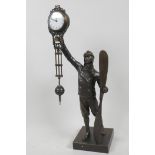 A bronze mystery clock cast in the form of a WWI pilot, 15" high