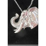 A silver elephant's head pendant necklace