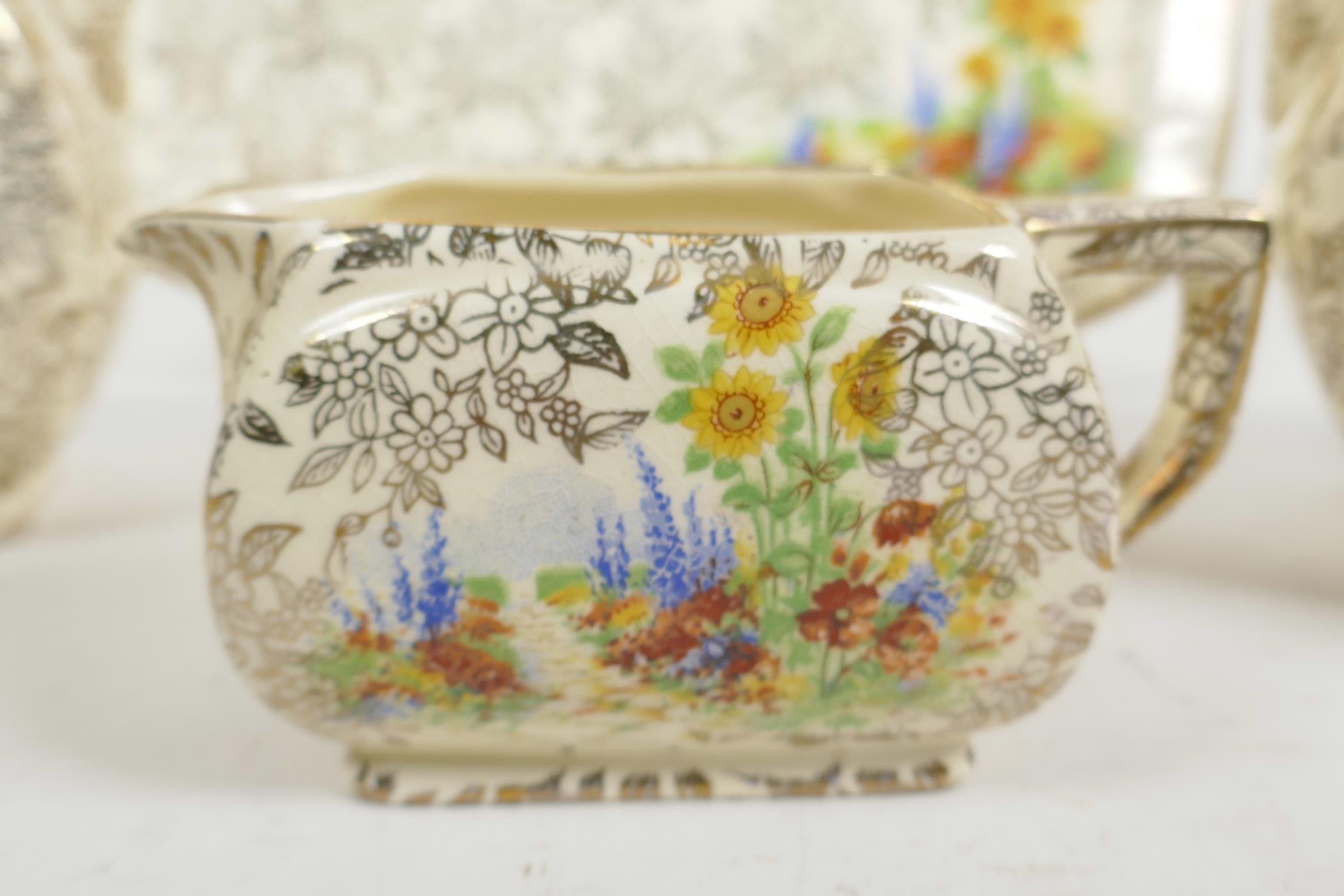 An Art Deco Empire Ware porcelain Garden Pattern teapot, water jug, milk jug and serving plate ( - Image 4 of 6
