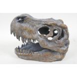 A replica T-Rex skull, 7½" long