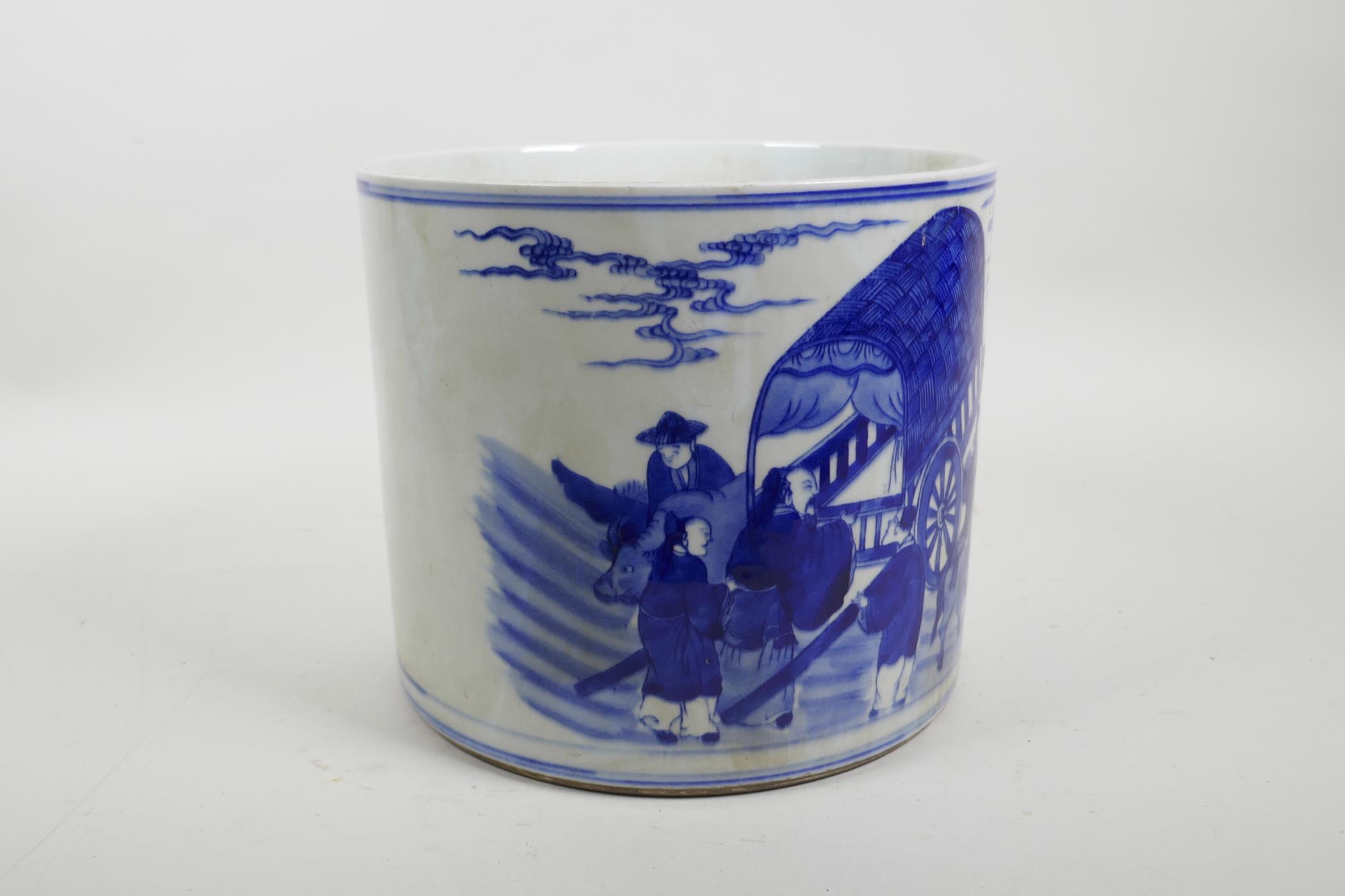 A Chinese blue and white porcelain brush pot decorated with a procession of carts and figures riding - Image 2 of 4