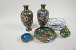 A Chinese Canton porcelain trinket box decorated with flowers and figures in a garden, 4 character