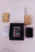 Five Zippo standard size pocket lighters in a presentation box