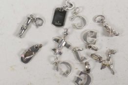 Ten miscellaneous silver charms