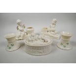 A collection of Irish Belleek porcelain and other creamware; a pair of Edwardian Belleek basketweave