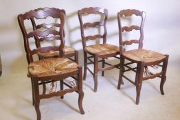 A set of four French country chairs with rush seats