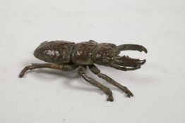 A Japanese Jizai style bronzed metal crab, impressed mark to underside, 2½" long