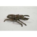 A Japanese Jizai style bronzed metal crab, impressed mark to underside, 2½" long