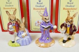 Three Royal Doulton Bunnykins figurines, 'Father and Mother', 'Wizard Bunnykins' and 'Fisherman