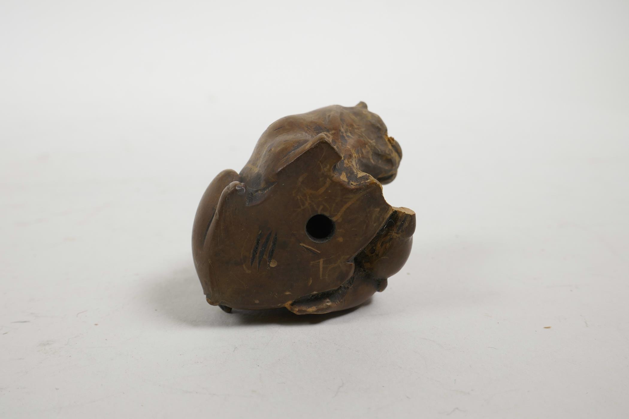 A late C19th/early C20th Japanese carved wood netsuke in the form of two Sharpei dogs, A/F, 1½" high - Image 3 of 3