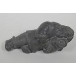 An Inuit black soapstone carving of a mother and child, 8½" long