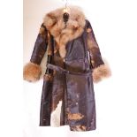 A fine vintage cow hide and fox fur lady's coat, approximate size 10-12