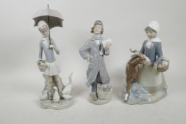 Three Lladro porcelain figures of a girl with a goat, a boy with delivery order, and a girl with