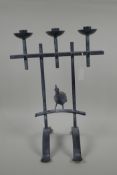 A bronze three branch candlestick with Middle Eastern bird decoration, 15½" high