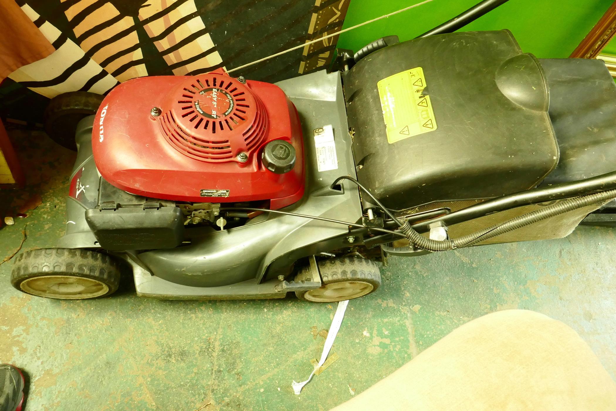 A Honda HR426 petrol lawn mower