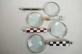 Four desk top magnifying glasses, lens 4" diameter