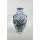 A Chinese Ming style blue and white porcelain vase of octagonal form with two lion mask handles